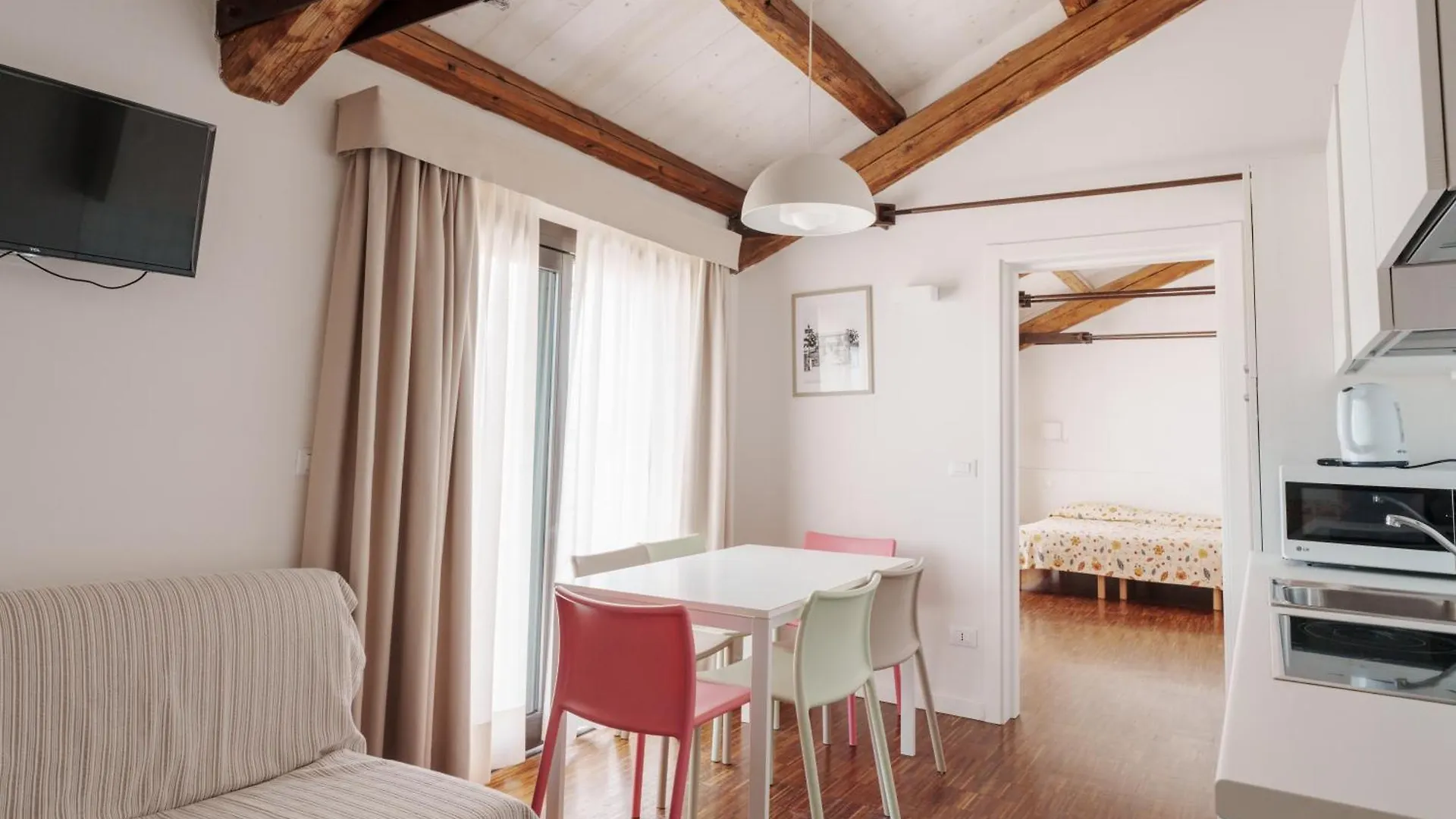 Апарт-отель Апарт отель Residenze Di La' Dal Fiume Каорле